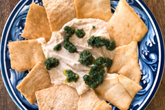 hummus with tahini sauce and zhoug